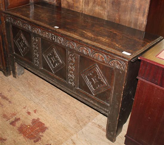 Carved panelled oak coffer